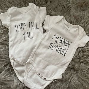 Pair of fall-themed onesies